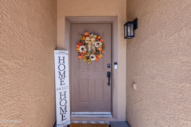 1145 E Lowell Ave, Gilbert, AZ 85295 - view of exterior entry featuring stucco siding
