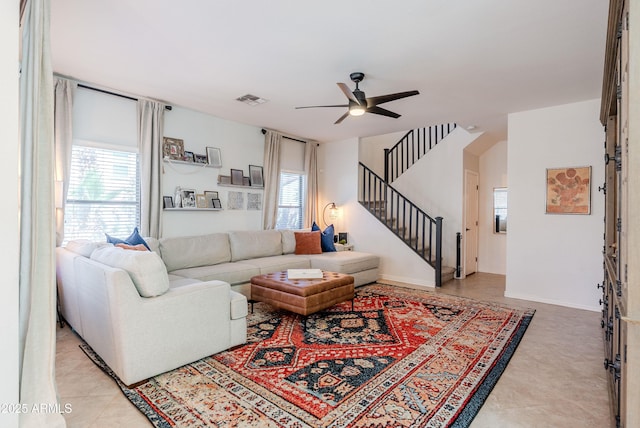 1145 E Lowell Ave, Gilbert, AZ 85295 - living area featuring ceiling fan, stairway, and baseboards