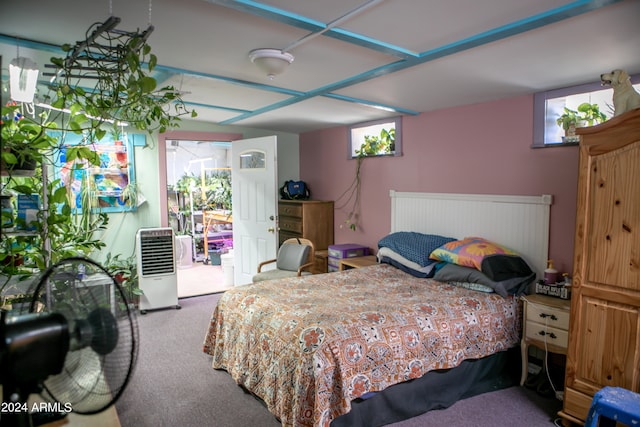 bedroom featuring access to outside and carpet flooring