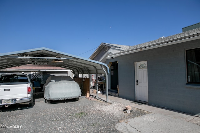 view of parking with a carport