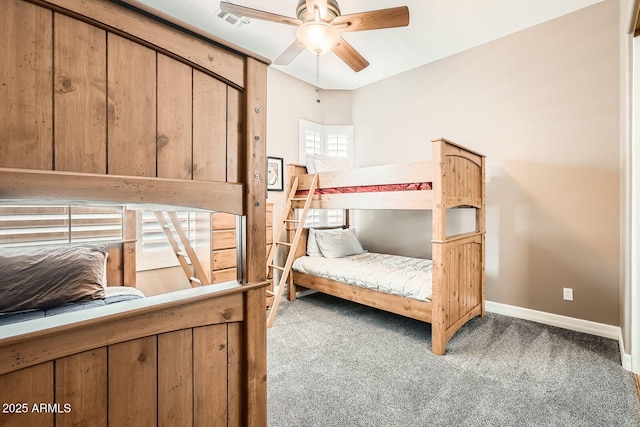 12448 N 129th Pl, Scottsdale, AZ 85259 - carpeted bedroom with baseboards and ceiling fan