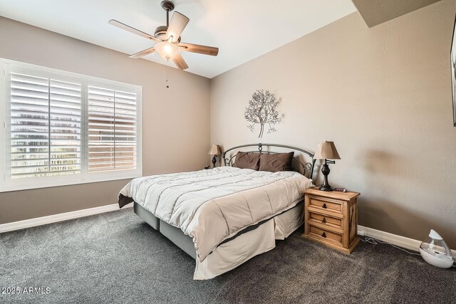 12448 N 129th Pl, Scottsdale, AZ 85259 - bedroom featuring dark carpet, baseboards, and ceiling fan
