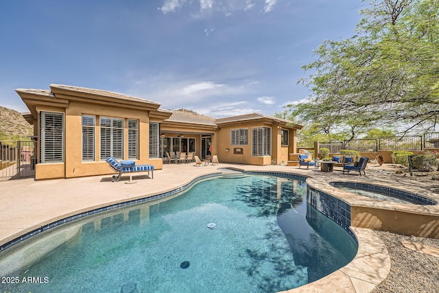12448 N 129th Pl, Scottsdale, AZ 85259 - view of swimming pool with a patio and a pool with connected hot tub