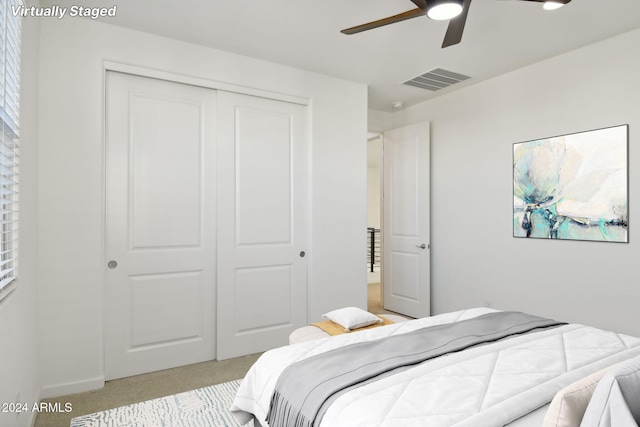 bedroom with a closet and ceiling fan