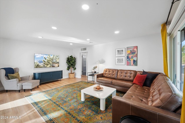 living room with light hardwood / wood-style floors