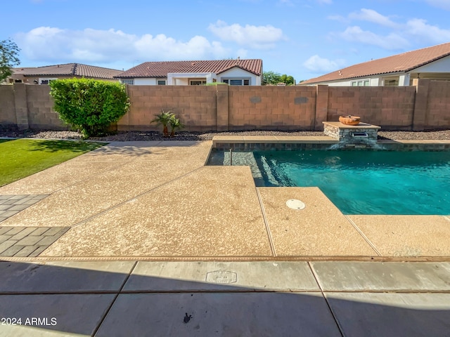 view of swimming pool with a fenced in pool and a fenced backyard