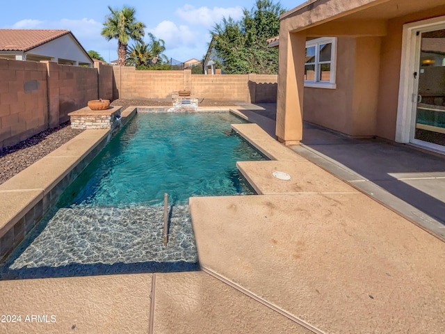 view of pool with a patio area, a fenced backyard, and a fenced in pool