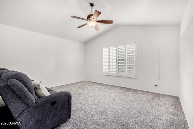 sitting room featuring lofted ceiling, carpet floors, and ceiling fan