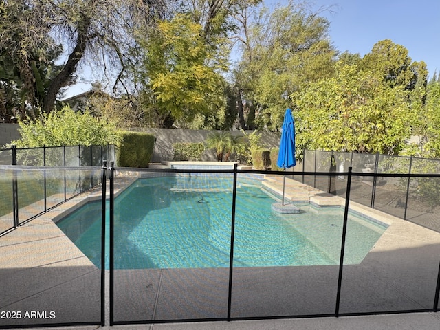 view of pool featuring a fenced in pool and a fenced backyard