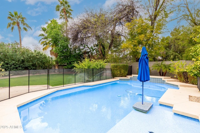 view of swimming pool with a fenced in pool and a fenced backyard