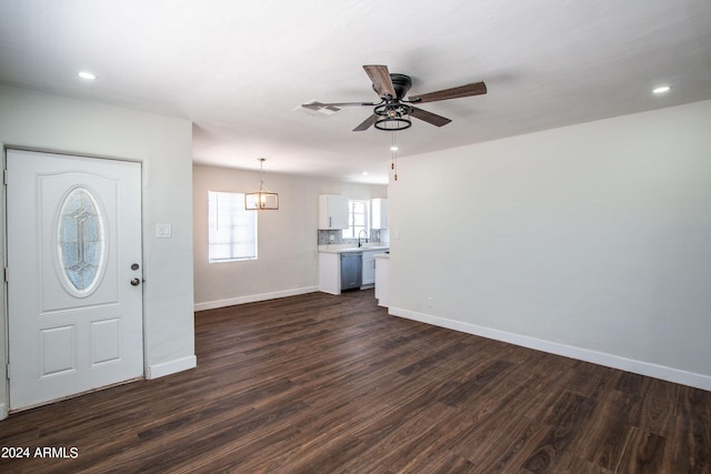 entrance foyer featuring ceiling fan, sink, and dark hardwood / wood-style flooring