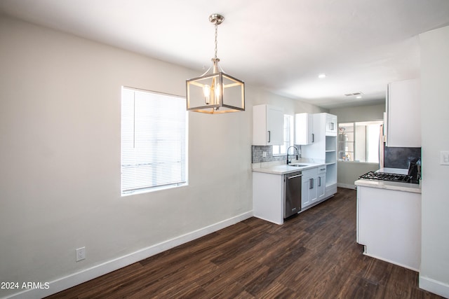 kitchen with dark wood-type flooring, white cabinets, hanging light fixtures, backsplash, and appliances with stainless steel finishes