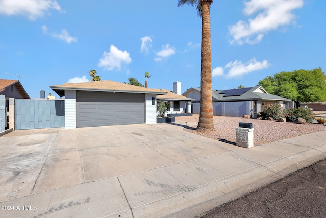 single story home with a garage