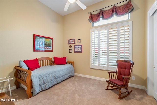 bedroom with light carpet and ceiling fan