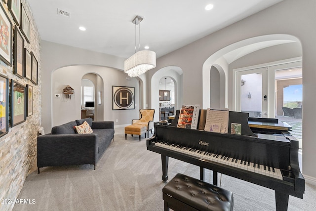 misc room with french doors and light colored carpet