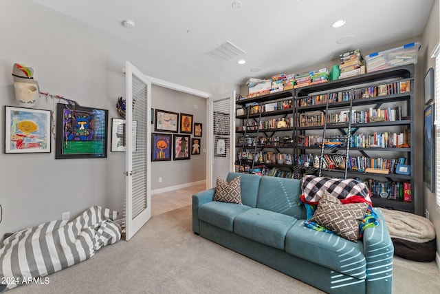 sitting room featuring carpet