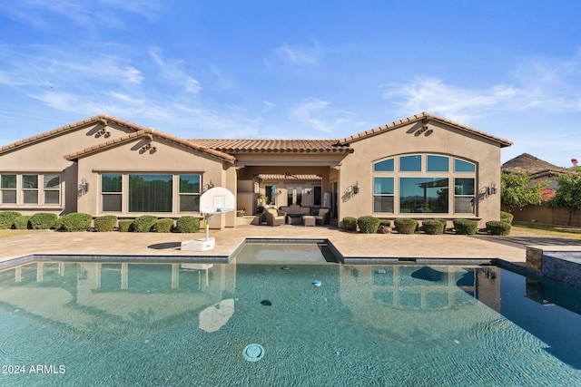 rear view of house with a patio