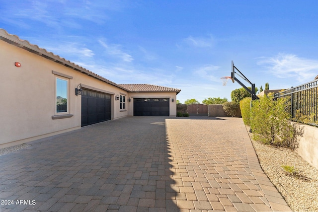 view of home's exterior with a garage