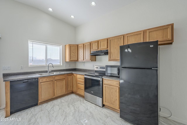 kitchen featuring sink, black appliances, and a towering ceiling