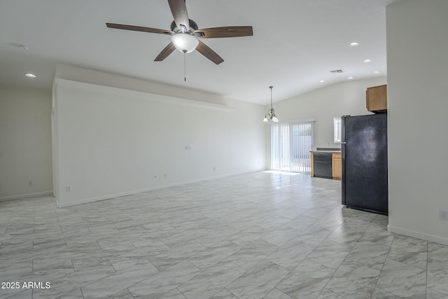 unfurnished living room featuring vaulted ceiling and ceiling fan