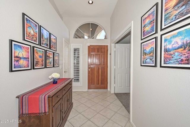 entryway with light tile patterned floors