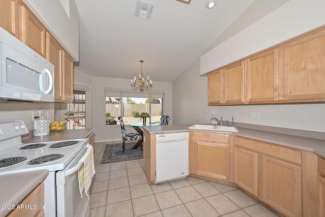 kitchen with lofted ceiling, sink, white appliances, light tile patterned flooring, and light brown cabinetry