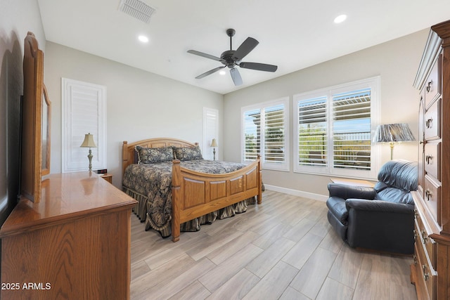 13236 W Montansoro Ln, Peoria, AZ 85383 - bedroom with light wood-style floors, baseboards, recessed lighting, and a ceiling fan