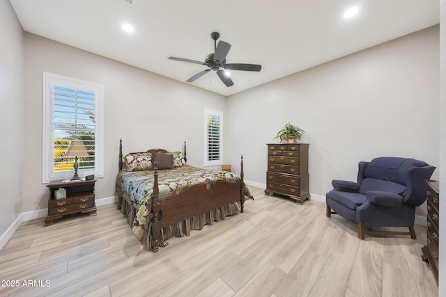13236 W Montansoro Ln, Peoria, AZ 85383 - bedroom with wood finished floors, baseboards, multiple windows, and recessed lighting