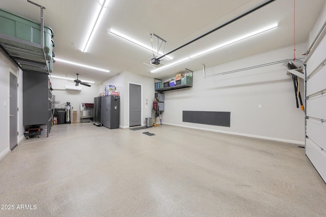 13236 W Montansoro Ln, Peoria, AZ 85383 - garage with a garage door opener and baseboards
