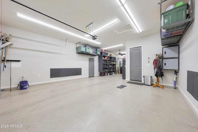 13236 W Montansoro Ln, Peoria, AZ 85383 - garage with baseboards and a garage door opener