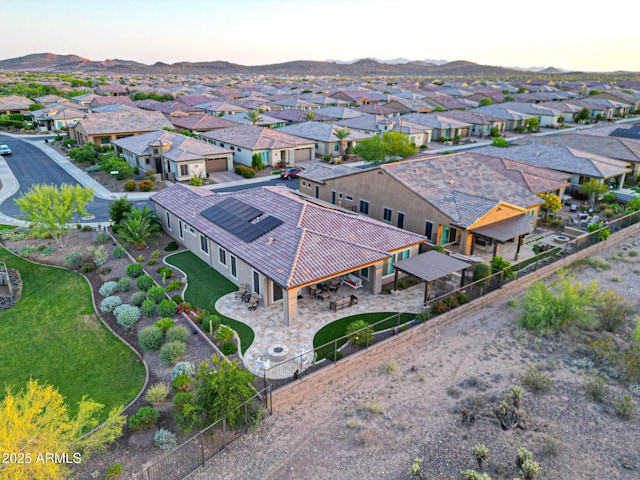 13236 W Montansoro Ln, Peoria, AZ 85383 - aerial view at dusk of a residential view and a mountain view