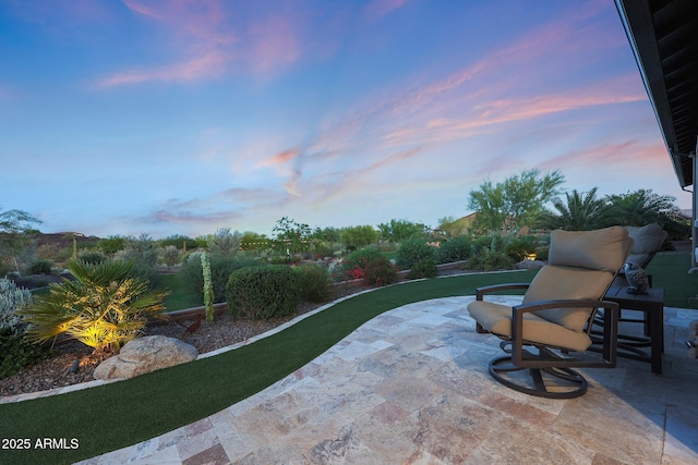 13236 W Montansoro Ln, Peoria, AZ 85383 - patio terrace at dusk featuring a patio area