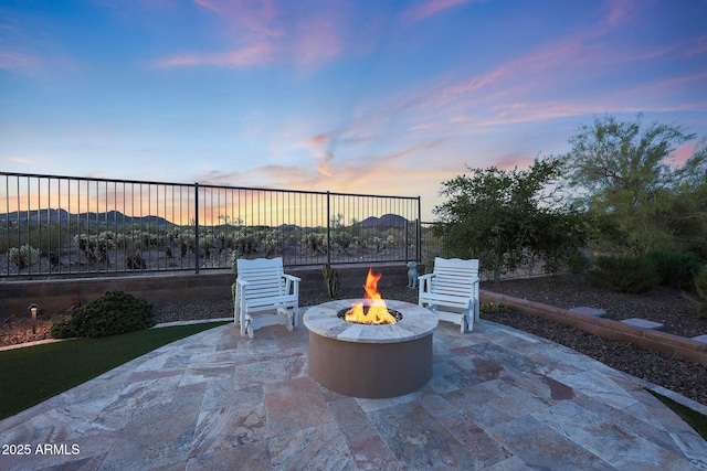 13236 W Montansoro Ln, Peoria, AZ 85383 - view of patio / terrace featuring an outdoor fire pit