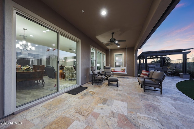 13236 W Montansoro Ln, Peoria, AZ 85383 - patio terrace at dusk featuring ceiling fan, a patio, and an outdoor hangout area