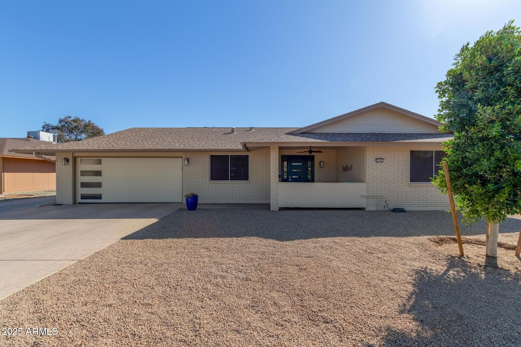 ranch-style home featuring a garage