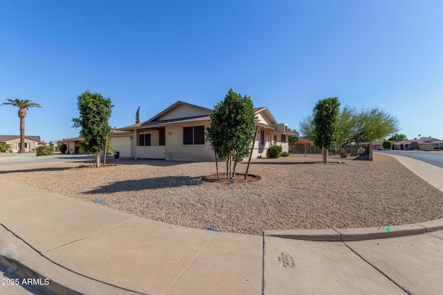 single story home with a garage