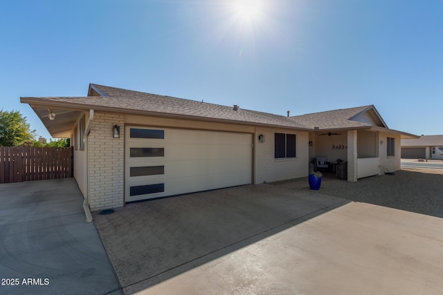 ranch-style home featuring a garage