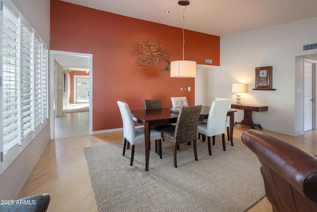 dining room featuring light hardwood / wood-style flooring