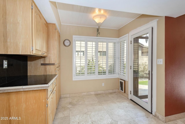 kitchen with light brown cabinetry