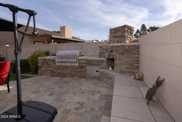 view of patio / terrace featuring area for grilling and grilling area