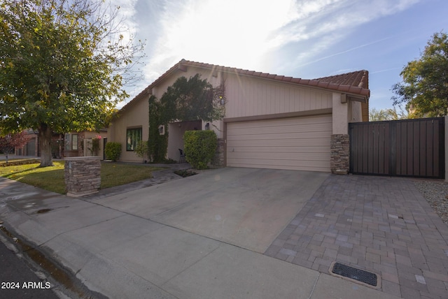 view of front of home with a garage