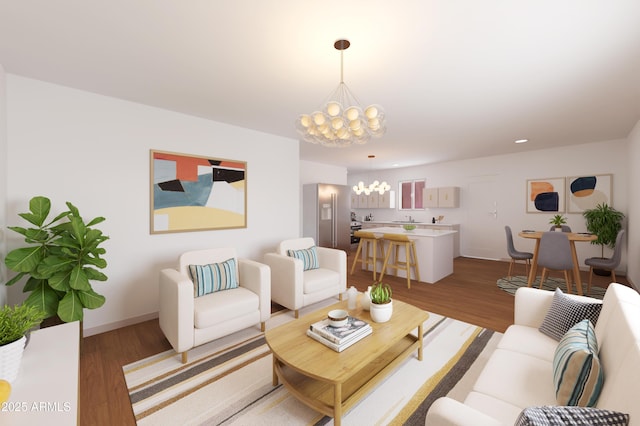 875 E Flint St, Chandler, AZ 85225 - living area featuring a chandelier, light wood-style floors, recessed lighting, and baseboards