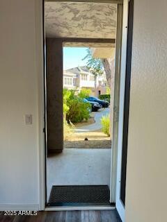 doorway featuring dark hardwood / wood-style floors