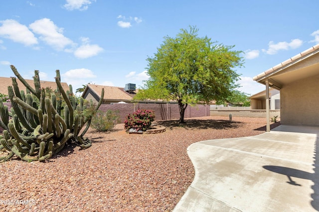 6942 S Championship Dr, Chandler, AZ 85249 - fenced backyard featuring a patio area