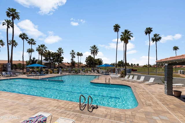 6942 S Championship Dr, Chandler, AZ 85249 - community pool with a patio area and fence