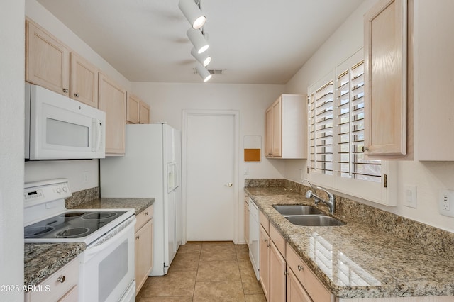 6942 S Championship Dr, Chandler, AZ 85249 - kitchen featuring white appliances, light brown cabinets, a sink, and track lighting