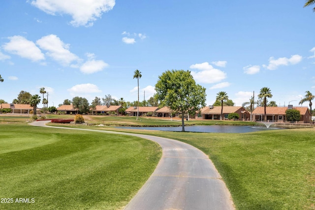 6942 S Championship Dr, Chandler, AZ 85249 - view of home's community with a water view, a lawn, and a residential view