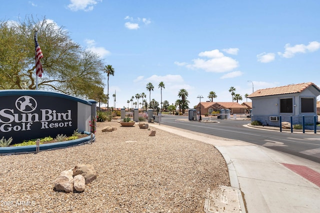 6942 S Championship Dr, Chandler, AZ 85249 - view of asphalt street with street lights, sidewalks, and curbs