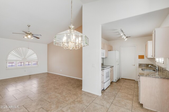 6942 S Championship Dr, Chandler, AZ 85249 - kitchen with white appliances, a sink, a chandelier, ceiling fan, and lofted ceiling