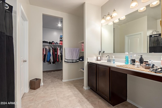 bathroom with vanity and tile patterned floors